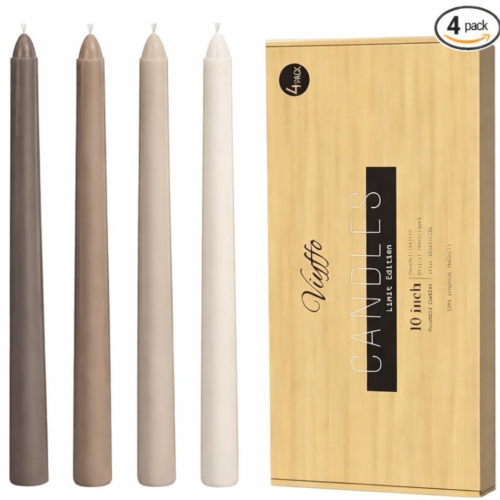 Set of four neutral-tone taper candles in elegant packaging; simple gift for coworkers